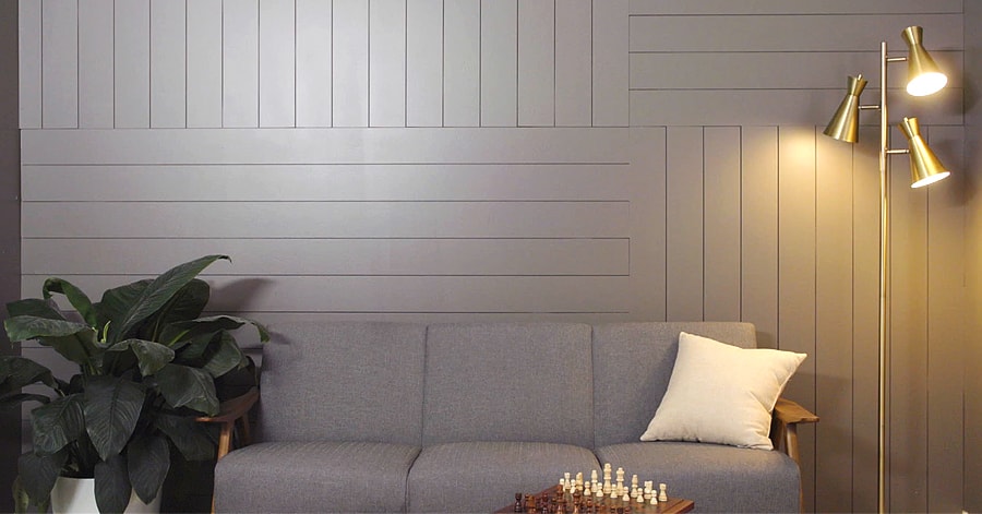 Dark grey shiplap wall with furniture