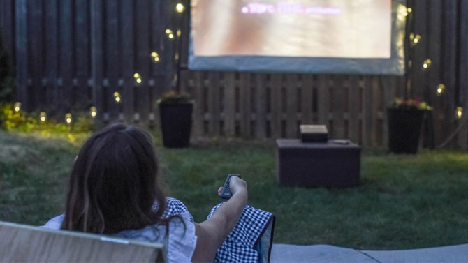 How To Build an Outdoor Cinema with a DIY Movie Screen and Seating