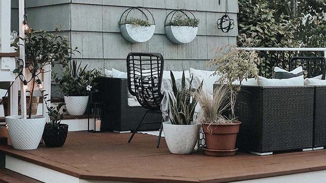 Cloe’s outdoor deck with new planters, and string lights